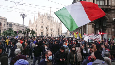 People demonstrate in Milan against the ‘Green Pass’, one of the most stringent anti-coronavirus measures in Europe.