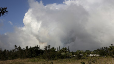 Gases rise from lava fissure 17 after it erupted early on Sunday.