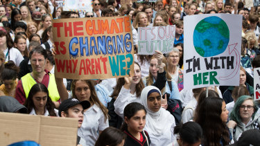Students take a day off school to protest at a climate change rally in Sydney in March.