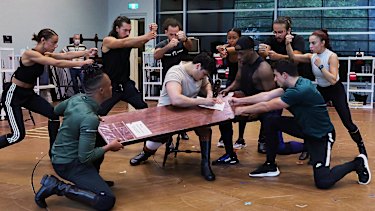 Jason Arrow (centre) and members  of the Australian cast of Hamilton during rehearsals in February. 
