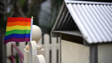The incident was sparked by a rainbow flag outside the neighbour's home. 