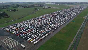 Truckers are parked on the runway at Manston airport as they await permission to cross the English Channel.