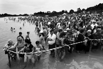 The Epiphany Festival at Yarra Bay where young men of Greek Orthodox faith dive for a cross that is blessed and thrown into the bay by an Orthodox priest. 