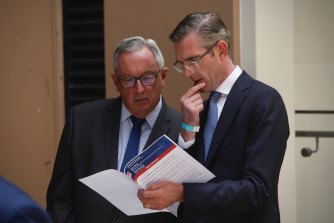 NSW Health Minister Brad Hazzard and Premier Dominic Perrottet at a press conference on Thursday.