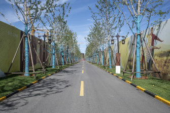 A road along the China Evergrande Group Royal Mansion residential development under construction in Beijing.