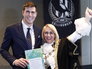 New Australian citizen Mason Cox with Melbourne Lord Mayor Sally Capp.