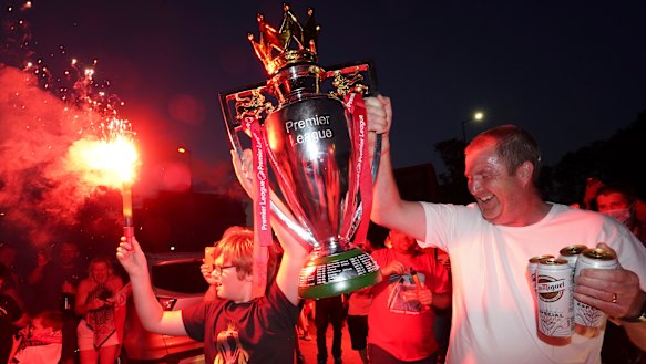 Fans gather outside Anfield as Liverpool celebrate a drought-breaking Premier League crown.