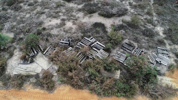 Broken pallets on the ground at Graham White's Kaniva property.