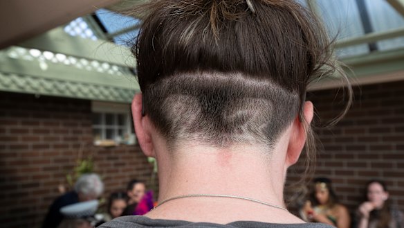  Kelsey Griffin's wife Erin has her number shaved into the back of her head.