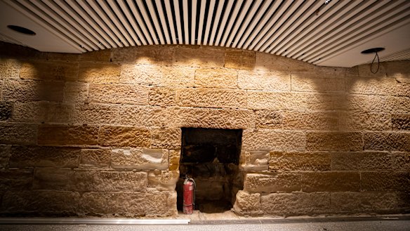 Sandstone walls and an old fireplace discovered  during the renovation. 