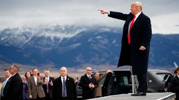 President Donald Trump arrives for a campaign rally at Bozeman Yellowstone International Airport.