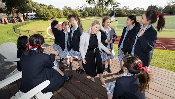 Principal Kristy Kendall with students this week.