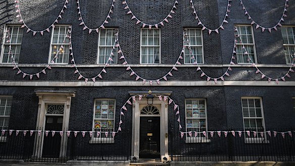 Union Jack bunting was strung across the front of Number 10 Downing Street.