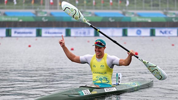 Curtis McGrath celebrates winning gold in Tokyo.