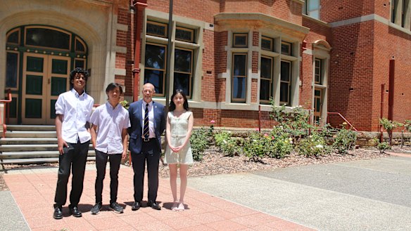 Some of Perth Modern’s top students from 2022, Raghav Ganapathy, Adam Holton and Jessica Doan with principal Mitchell Mackay.