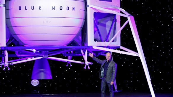Jeff Bezos in front of a model of Blue Origin's Blue Moon lunar lander on Thursday.