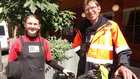 Jessica Balmer and Edward Collins tend to a planter box in East Perth.
