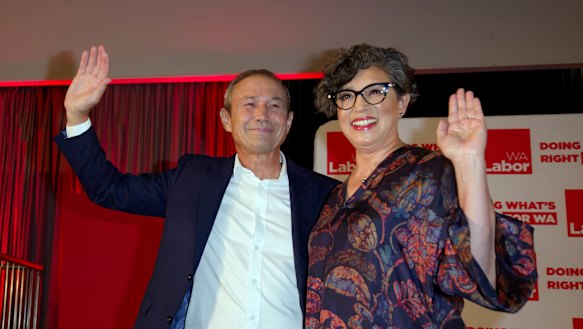Premier Roger Cook addresses supporters with wife Carly Lane at campaign HQ in Medina as the ALP celebrates being returned to power in WA.
