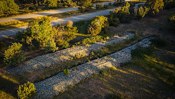 The glass dump at Caitlin Miller's property off the Federal Highway near Lake George.