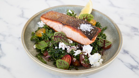  Z.I.A Kitchen's crisp-skinned salmon fillet with "kabbouli" salad, where kale leaves stand in for parsley. 