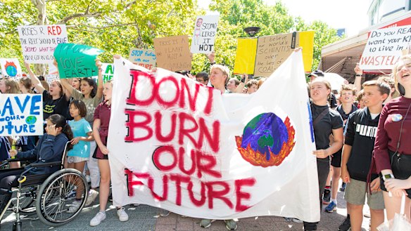 Canberra school students strike from school to protest Adani's coal mine and government inaction on climate chang