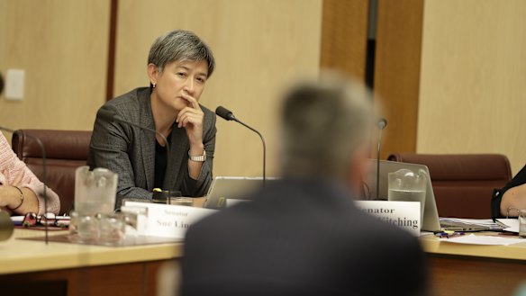Labor senator Penny Wong listens to Finance Minister Mathias Cormann in a committee hearing on Tuesday morning.