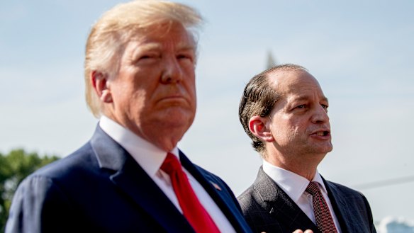 US Labor Secretary Alex Acosta, right, with President Donald Trump, before he resigned over his handling of the earlier Jeffrey Epstein case.