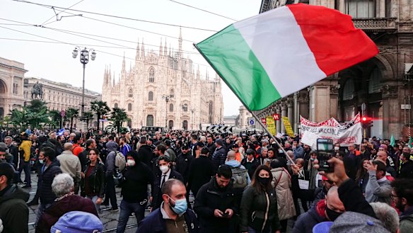 People demonstrate in Milan against the ‘Green Pass’, one of the most stringent anti-coronavirus measures in Europe.