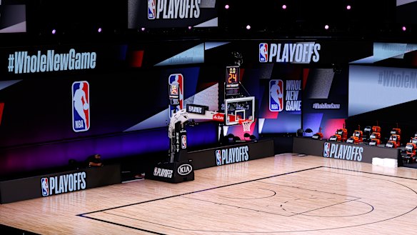 An empty court and bench where the Bucks and Magic were scheduled to play at the ESPN Wide World Of Sports Complex in Lake Buena Vista, Florida. 