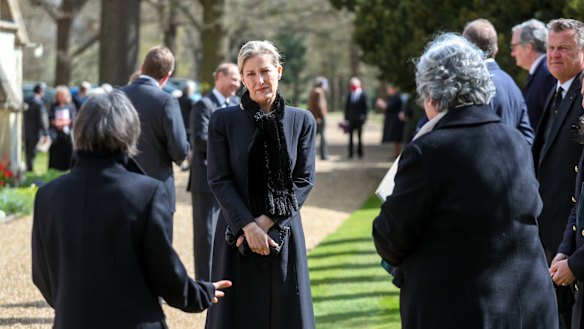Sophie, Countess of Wessex talks to household staff and mourners at a small church service at Windsor.