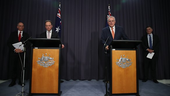 Chief Medical Officer Professor Paul Kelly, Health Minister Greg Hunt, Prime Minister Scott Morrison and Health Department secretary Professor Brendan Murphy announced the new advice on Thursday night.