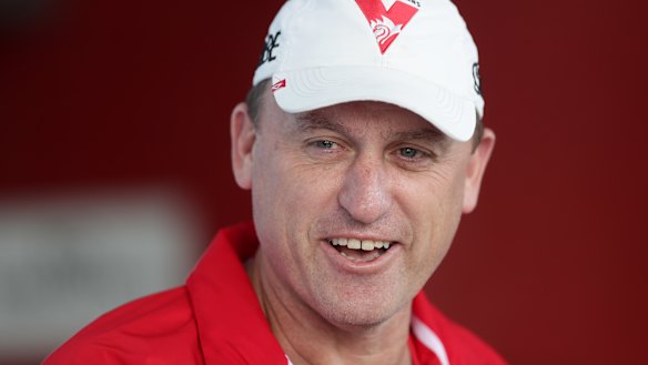 Swans coach John Longmire admits live AFL content in Sydney is crucial to the game's growth.