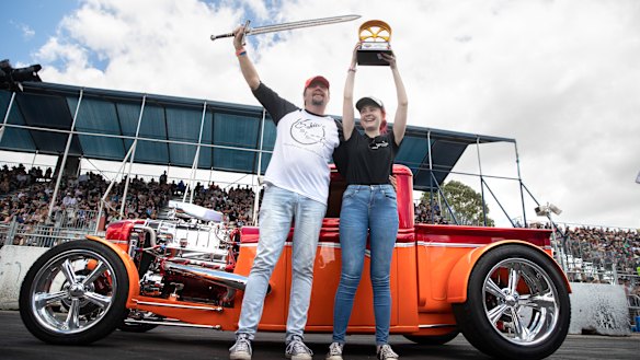 Rick Werner from the Gold Coast celebrates with his daughter Danielle after his 1932 Ford pickup hotrod was named the 2019 Summernats Grand Champion