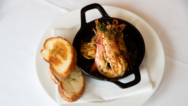 Trio of garlic and chilli-laden Mooloolaba king prawns at Beppi's.