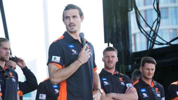 Phil Davis addresses fans at the Giants' Olympic Park base on Sunday, the day after losing the grand final.