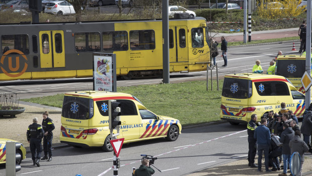 Emergency services attend the scene of a shooting in Utrecht, Netherlands.