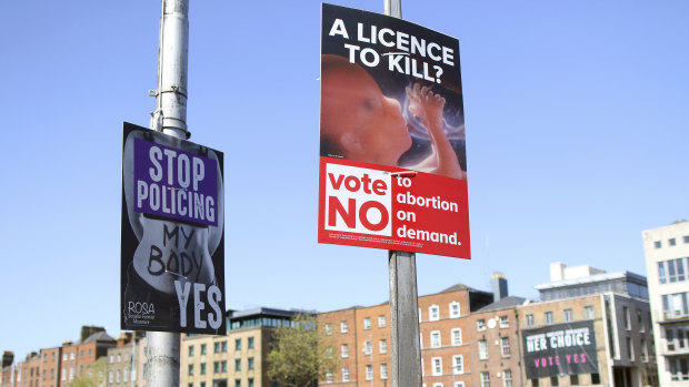 Pro and anti-abortion posters reflect voters' differences of opinion in Dublin.