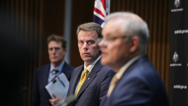 Education Minister Dan Tehan (centre) said the $1.6 billion temporary overhaul will begin from Sunday night.