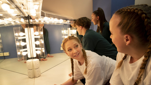 Caroline Chisholm High School dancers Kailey Jitts and Mikayla Leishman backstage at Canberra Theatre, with Canberra College dancers Thomas Adams-Walker and Lizzie Rice.