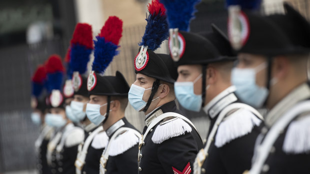 Italian carabinieri in face masks as they commemorate the country's Armed Forces Day.