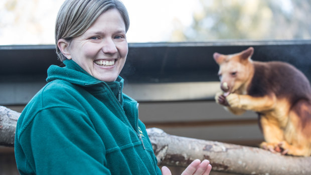 Shelley Russell with tree kangaroo, Simbu. In 1998, Ms Russell's dad told  her he wanted to buy a zoo. Twenty years later, Ms Russell is the life sciences manager at The National Zoo and Aquarium. 