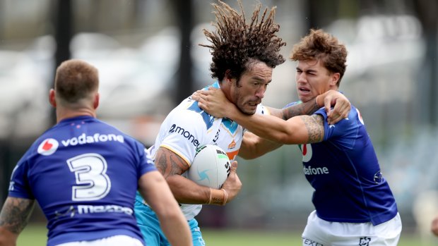 Titans forward Kevin Proctor battled hard in a tough first outing for the Gold Coast in 2021.
