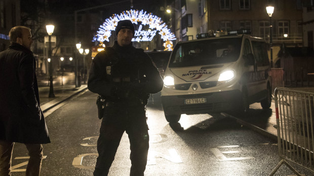 Emergency services patrol at the centre of the city of Strasbourg following a shooting, eastern France.