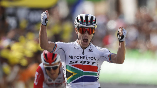 Daryl Impey crosses the line to win the ninth stage of the Tour de France on Sunday.