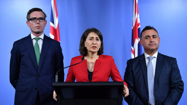 NSW Treasurer Dominic Perrottet, Premier Gladys Berejiklian and Deputy Premier John Barilaro have announced a budget targeting roads, health and education in the region surrounding Canberra.
