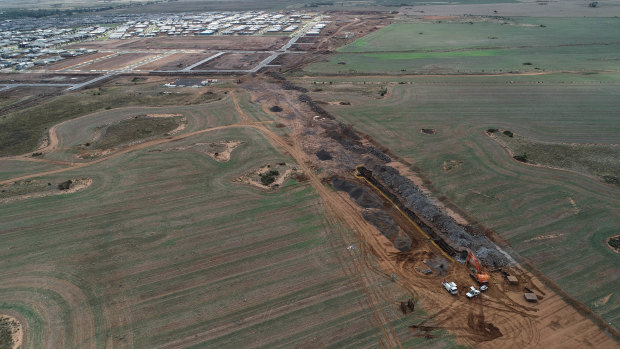 The Wyndham Vale rail stabling yard now under construction is just north of housing estates.
