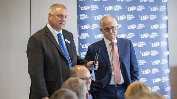 Prime Minister Malcolm Turnbull during an earlier appearance with the LNP's candidate for Longman, Trevor Ruthenberg. 