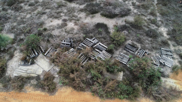 Broken pallets on the ground at Graham White's Kaniva property.