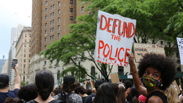 Protesters march on Saturday, June 6, 2020, in New York. 