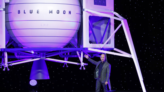 Jeff Bezos in front of a model of Blue Origin's Blue Moon lunar lander on Thursday.